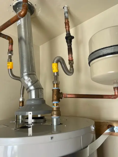 Water heater installation and plumbing repair in Cardwell Colony